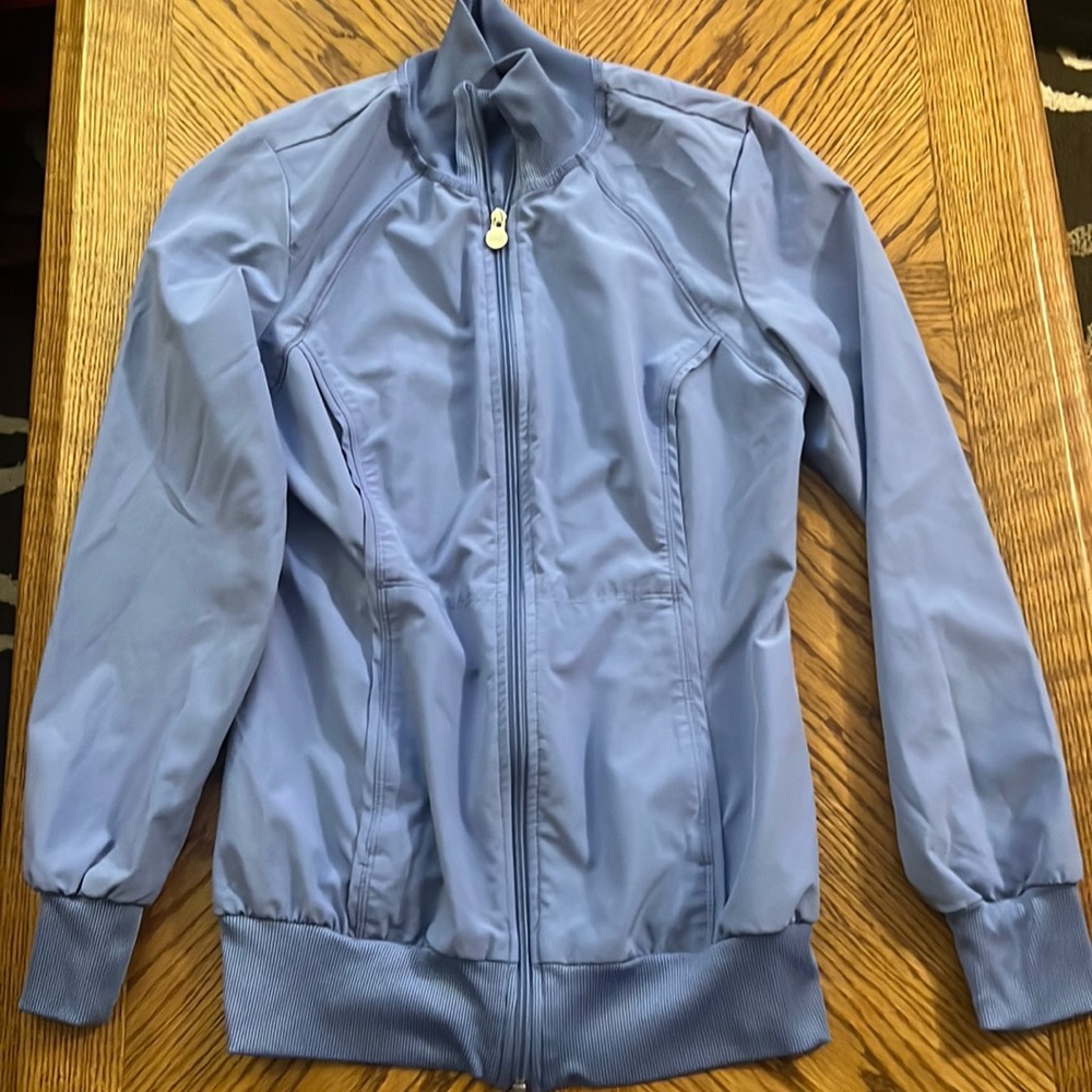 Light blue lightweight jacket with zipper pockets XS